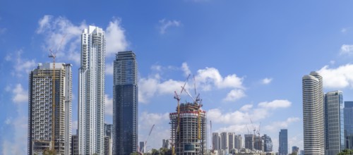 Scenic Tel Aviv financial and business district skyline, construction of new office buildings