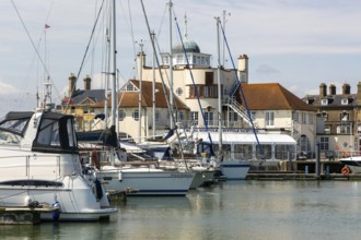 Yachts at moorings in harbour of Royal Norfolk and Suffolk yacht Club, Lowestoft, Suffolk, England,