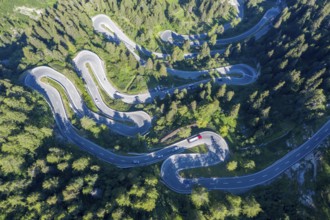 Curves of Majola mountain pass, drone shot, Switzerland, Europe