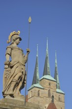 Minerva fountain and church tower of the UNESCO Gothic Church of St Severus, sculpture of Minerva