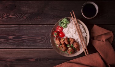 Asian traditional cuisine, fried chicken Teriyaki, with side dish, rice and vegetables, top view,