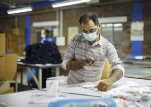 Employees of Inter Market Knit Private Limited producing socks. Lahore, 22.08.2024. Photographed on