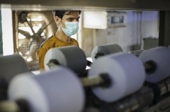 Employees of Inter Market Knit Private Limited producing socks. Lahore, 22.08.2024. Photographed on