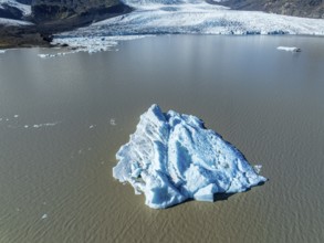 Aerial view over the glacial lake Fjallsárlón, glacier Fjallsjökull, part of Vatnajökull glacier,