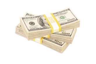 Ten thousand dollar stacks of one hundred dollar bills isolated on white