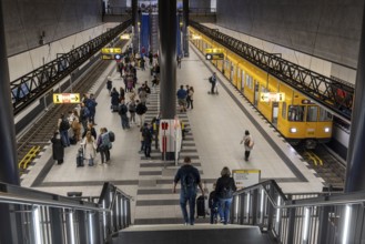 Berlin Central Station underground station. Platform with passengers on the U5 line to Hönow.