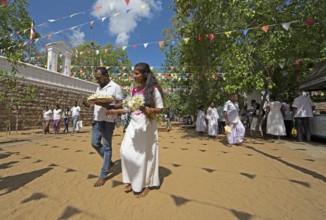 Sri Lankan pilgrims in the holy city of Anuradhapura, North Central Province, Sri Lanka, Asia