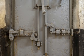 Locking mechanism on gas-tight steel armoured door inside Fort van Liezele, fortress of the