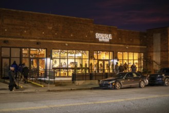 Detroit, Michigan - People shop for luxury watches and other items at the Shinola Detroit store on