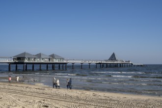 Holidaymakers walking on the beach, pier, Heringsdorf, Usedom Island, Baltic Sea,