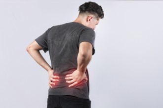 Man with spine problems isolated. Lumbar problems concept, a sore man with back pain