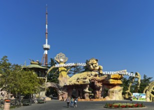 Visitors at the entrance to the Mtazminda Amusement Park on Mtazminda Mountain, Tbilisi, Georgia,