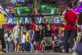 Crowds of people on Bangla Street in the evening. Nightlife on Bangla Walking Street with go-go