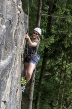 Ketterin rock climbing, woman climbing toprope, sport climbing, climbing garden Bad Heilbrunn