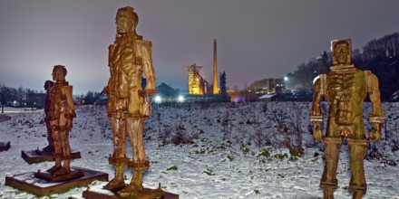 People made of iron, multi-part iron sculpture by Zbigniew Fraczkiewicz in front of the