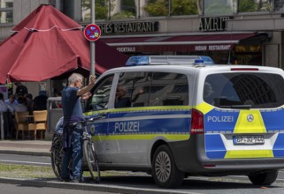 Police vehicle in Berlin traffic, Berlin, Germany, Europe