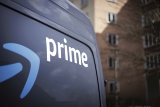 A detail of a trolley labelled prime from the online mail order company Amazon prime in a housing