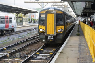 Great Northern Class 387 train arriving at platform, Cambridge, Cambridgeshire, England, UK