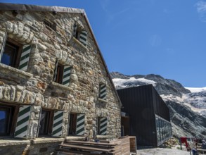 Mountain hut Cabane de Moiry, located close to the retreating Moiry glacier, Valais, Switzerland,