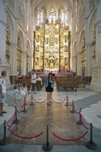 Visitors at the tomb of El Cid in the Cathedral of Santa Maria of Burgos, behind the main altar