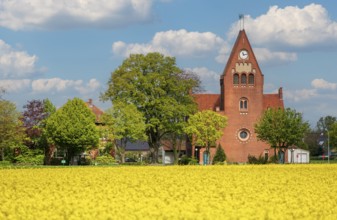 Christuskirche with rape field Todtenhausen Minden Germany