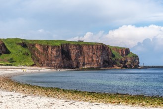 View over the Nordstrand, red sandstone cliff on the offshore island of Heligoland, North Sea,