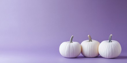 Three white pumpkins on violet background with copy space. Generative Ai, AI generated