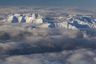 Mountain peaks above high fog, evening light, winter, view from Zugspitze to Ammergau Alps, Upper