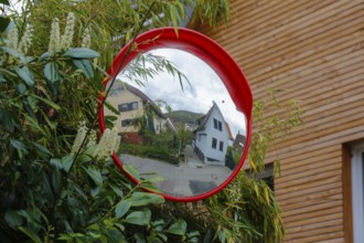 Traffic mirror, reflection, residential area, houses, Gönningen, district of Reutlingen,