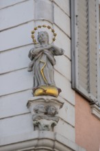 Sculpture of the Virgin Mary on a corner house, Endingen, Baden-Württemberg, Germany, Europe