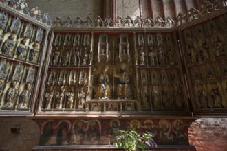 Altar retable from 1430 from St Georgen set up in St Nikolai's Church, late Gothic brick building,