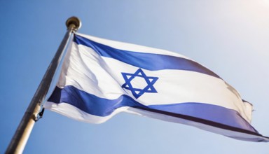 Flag, the national flag of Israel fluttering in the wind