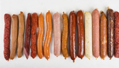 Food, meat products, various sausages on a white surface AI generated, AI generated