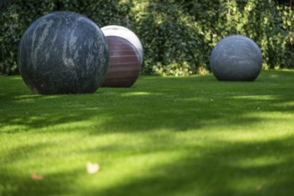 Sculpture Pars pro Toto, stone balls by Alicja Kwade, Sculpture Park, Louisiana Museum of Modern