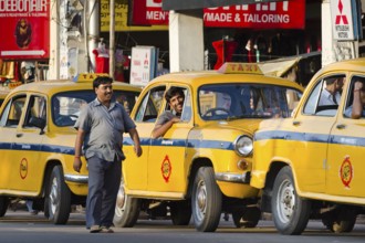 Laughing taxi drivers and taxis, Calcutta or Kolkata, West Bengal, East India, India, Asia