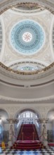 Magnificent interior with red and gold staircase and imposing domed ceiling, Belfast