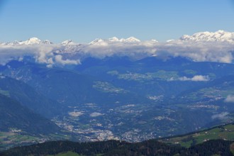 Panoramic view of Ortisei, surrounded by mountains, under a cloud cover, Val Gardena, South Tyrol,