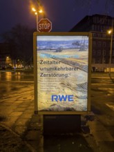 Alleged advertising poster of the energy company RWE, which professes the environmental destruction