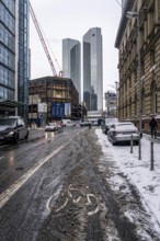 Onset of winter, poorly cleared cycle lane, in the city centre of Frankfurt, Hesse, Germany, Europe