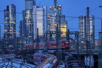 Railway tracks in front of the main railway station in Frankfurt am Main, skyline of skyscrapers in