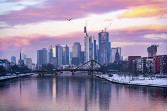 The skyline of Frankfurt am Main, skyscrapers of the banking district, Flößerbrücke, wintry