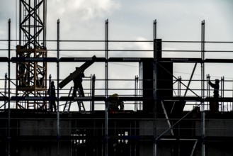 Scaffolding being erected, construction site, shell of a residential building, Gelsenkirchen North