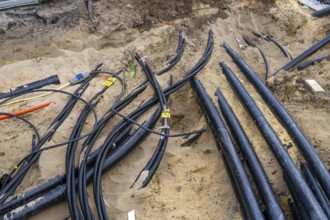 Supply lines, laid underground, exposed during a construction project, Bochum, North