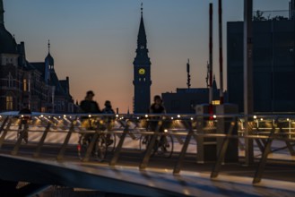 Cyclists on the Lille Langebro cycle and pedestrian bridge over the harbour, Copenhagen is