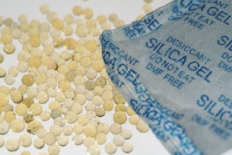 Silica gel, desiccant, is often used in packaging for technical devices, packed in small bags,