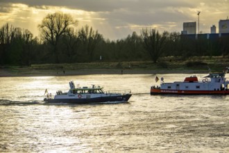 The Rhine near Düsseldorf, cargo ships, patrol boat of the water police, North Rhine-Westphalia,