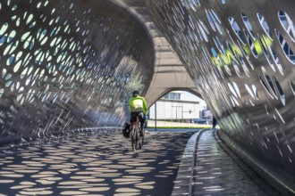 Light effects from the sun in the Parkbruk, a cycle and pedestrian bridge in the city centre of