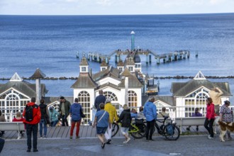 The pier of Sellin, 394 metres long, with restaurant, jetty, tourists, island of Rügen,