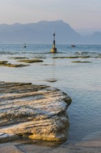 Evening mood at Jamaica beach, lake, holiday, travel, tourism, Sirmione, Italy, Europe