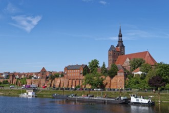 The river Tangier at the harbour of Tangermünde in front of the city wall and the old town and the